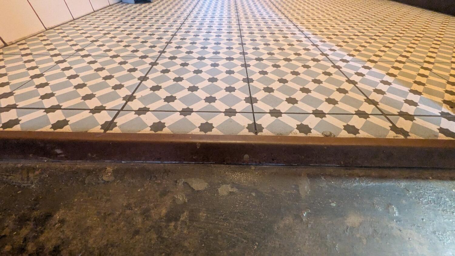 Step at foot of door.