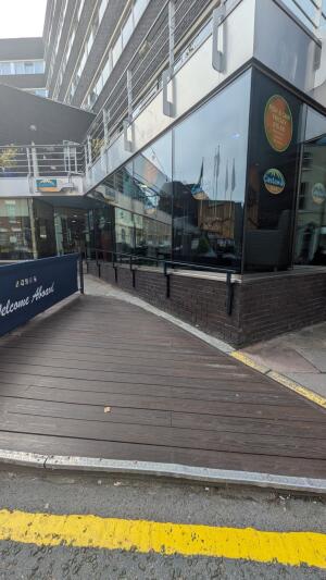 From street facing venue. Path to doors ahead