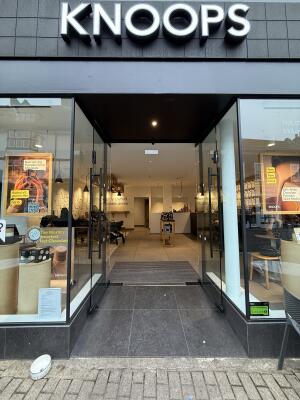 Glass doors ahead. Pull from centre to open.