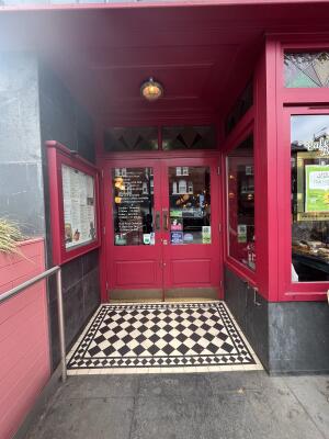 Archway to door ahead.