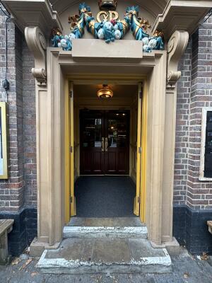 From street facing venue. Yellow doors ahead. Push doors from centre to open inwards.