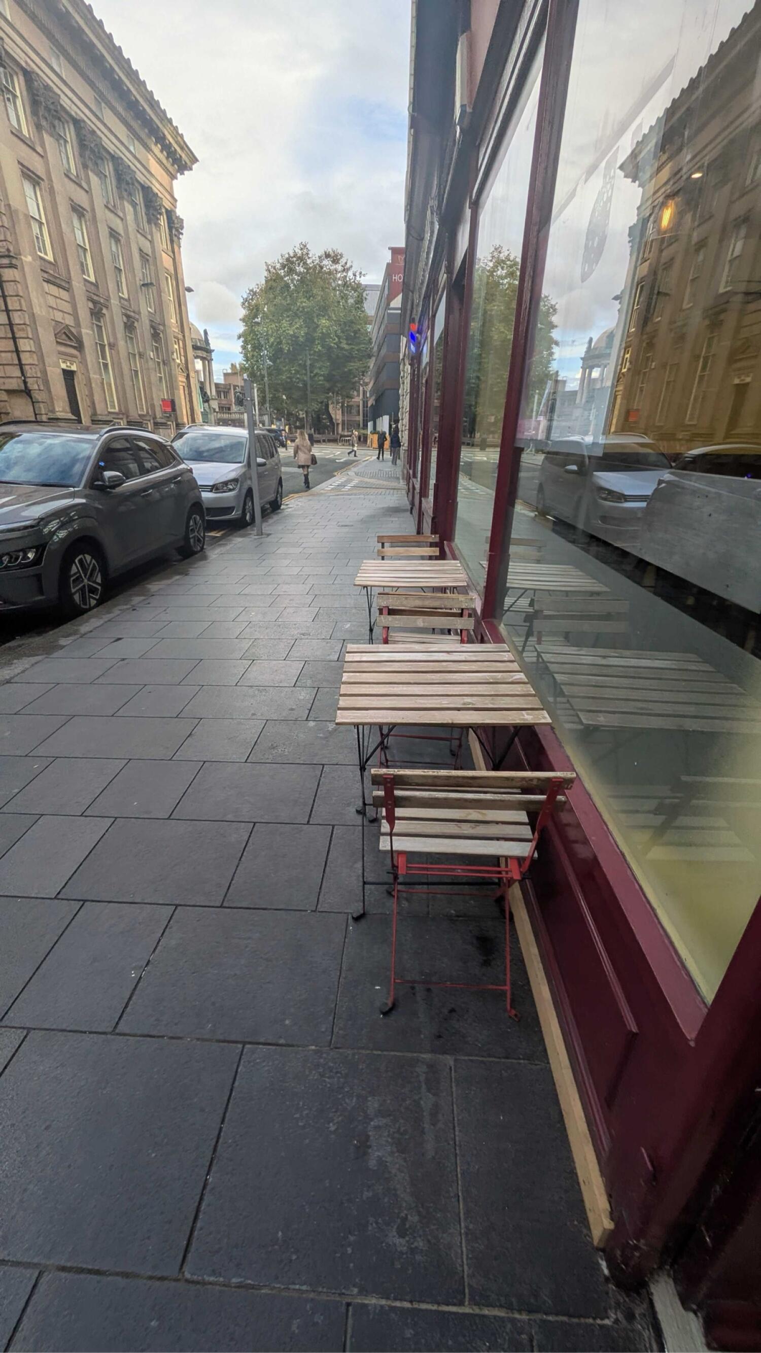 From entrance facing left. Tables and chairs ahead.