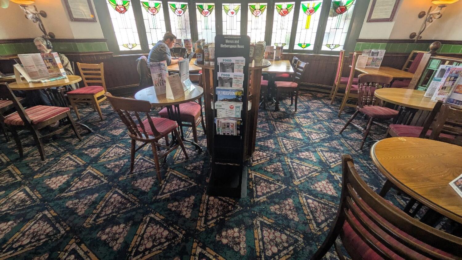 From steps facing straight. Tables and chairs to both sides and center