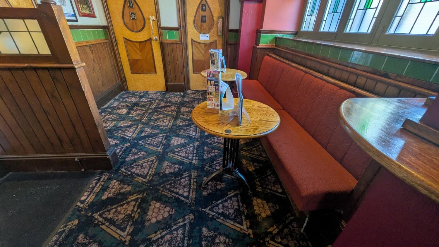From arcade machines facing straight. Half booths and tables along right
