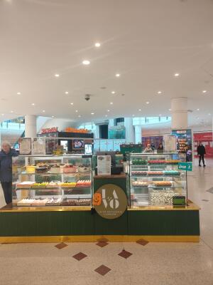 From mall corridor facing venue. Step free access to venue.
