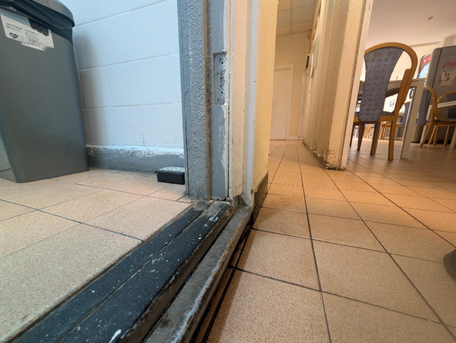 Step at bathroom door.