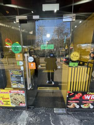Glass door ahead. Push from right to open.