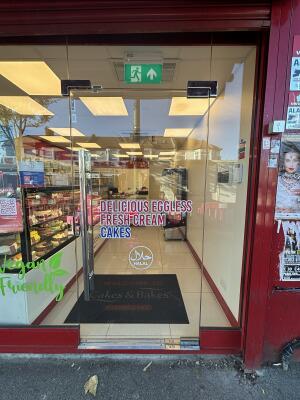 Glass door ahead. Push handle on left to open.