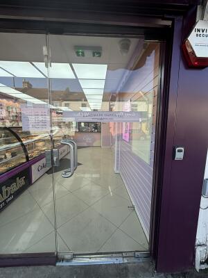 Glass door ahead. Push from left to open.