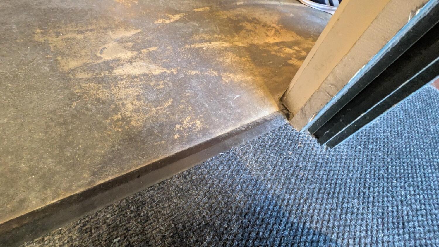 Small bump at foot of door.