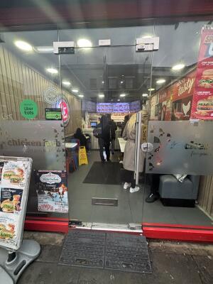 Glass door ahead. Push from right to open.