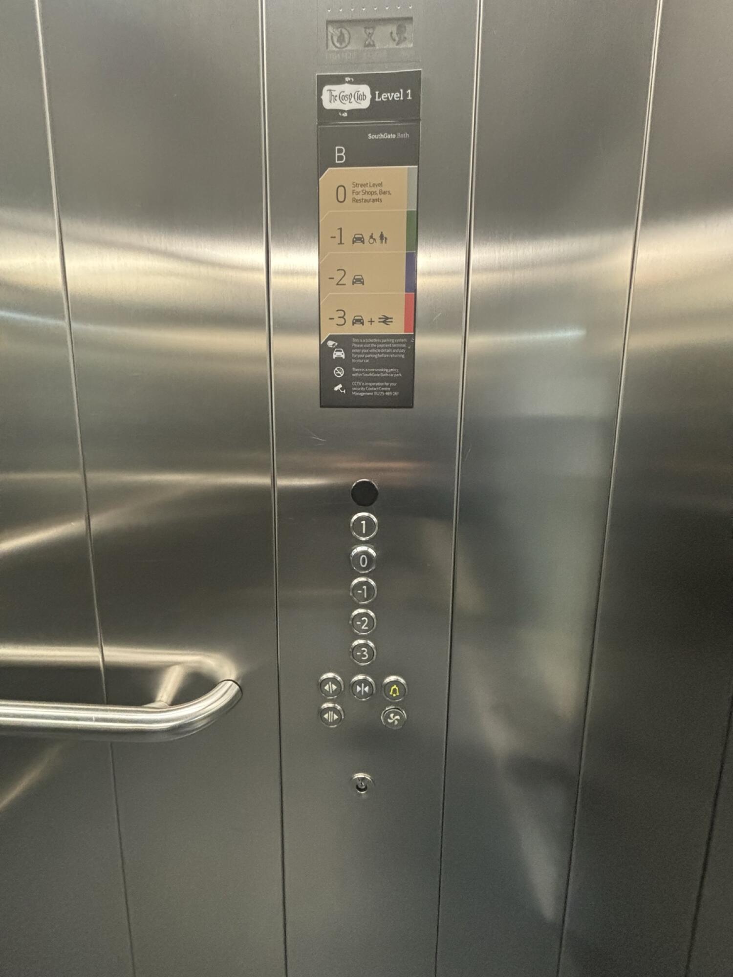 Call buttons on right side from lift doors.