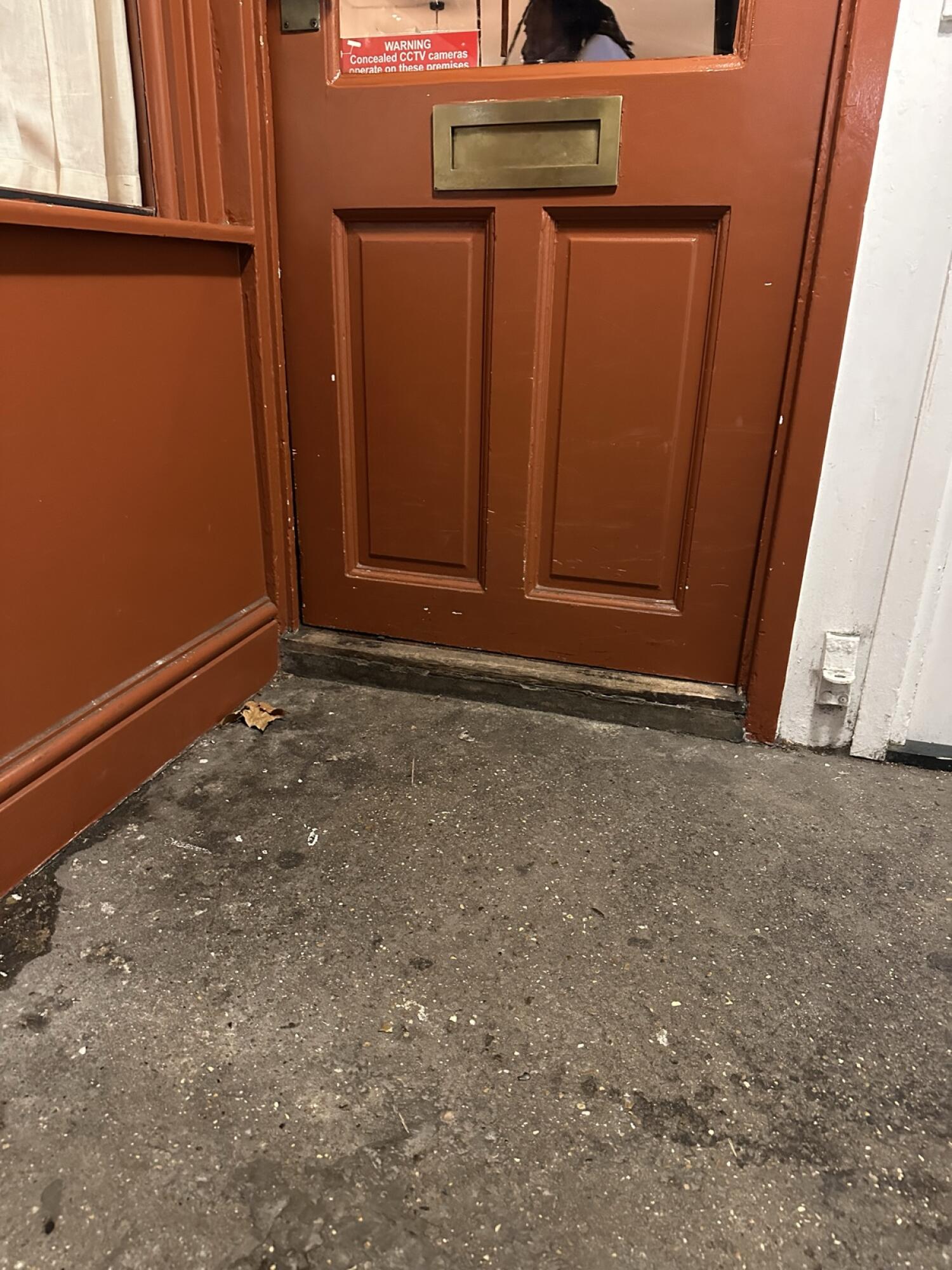 Small bump at foot of door.