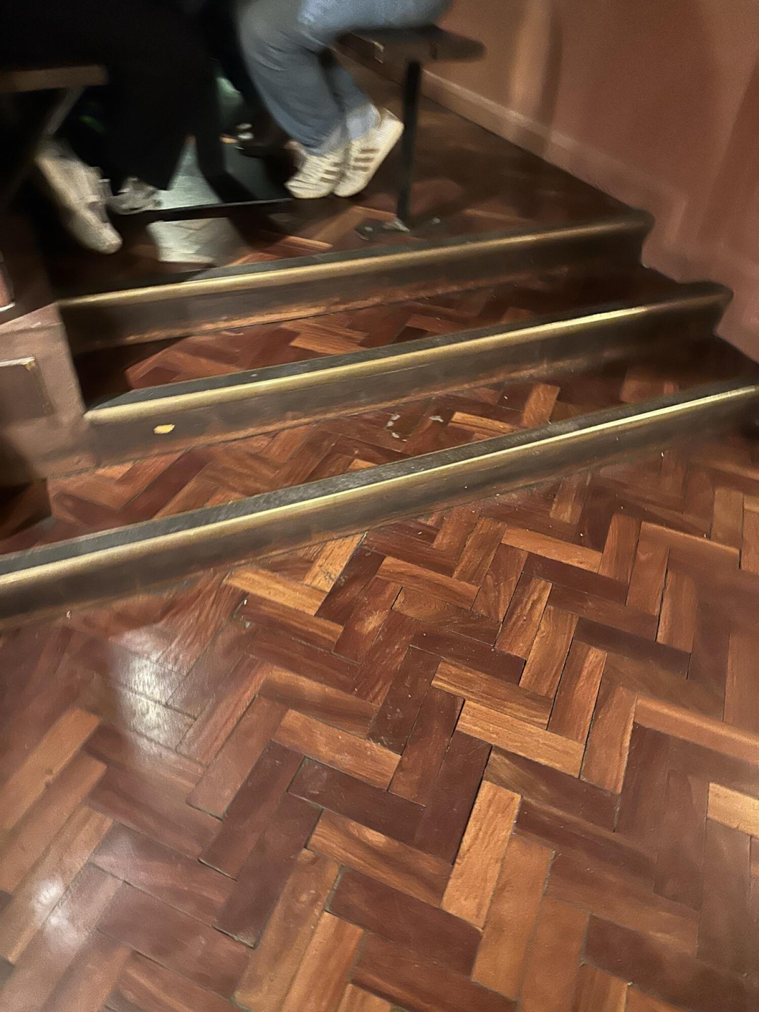 Three steps up to seating area.