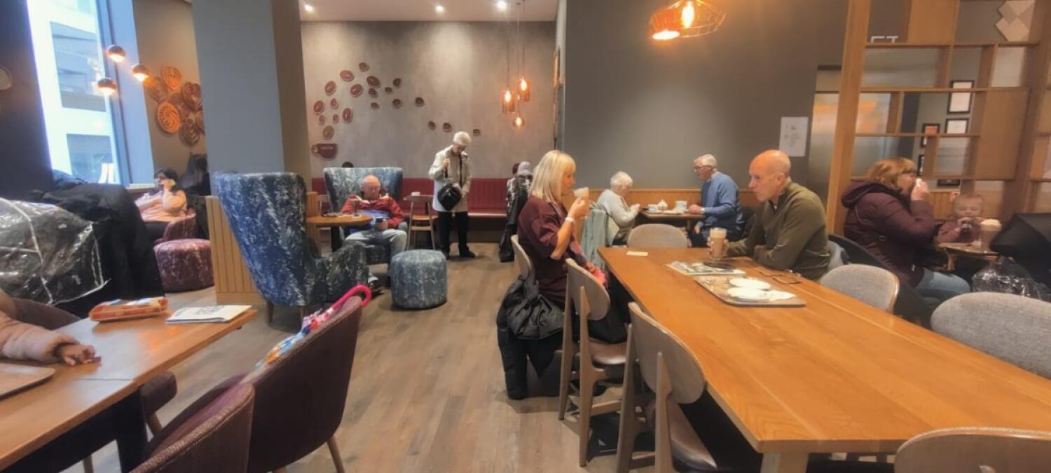 From left of main area. facing right. Pillar and half booth along back right