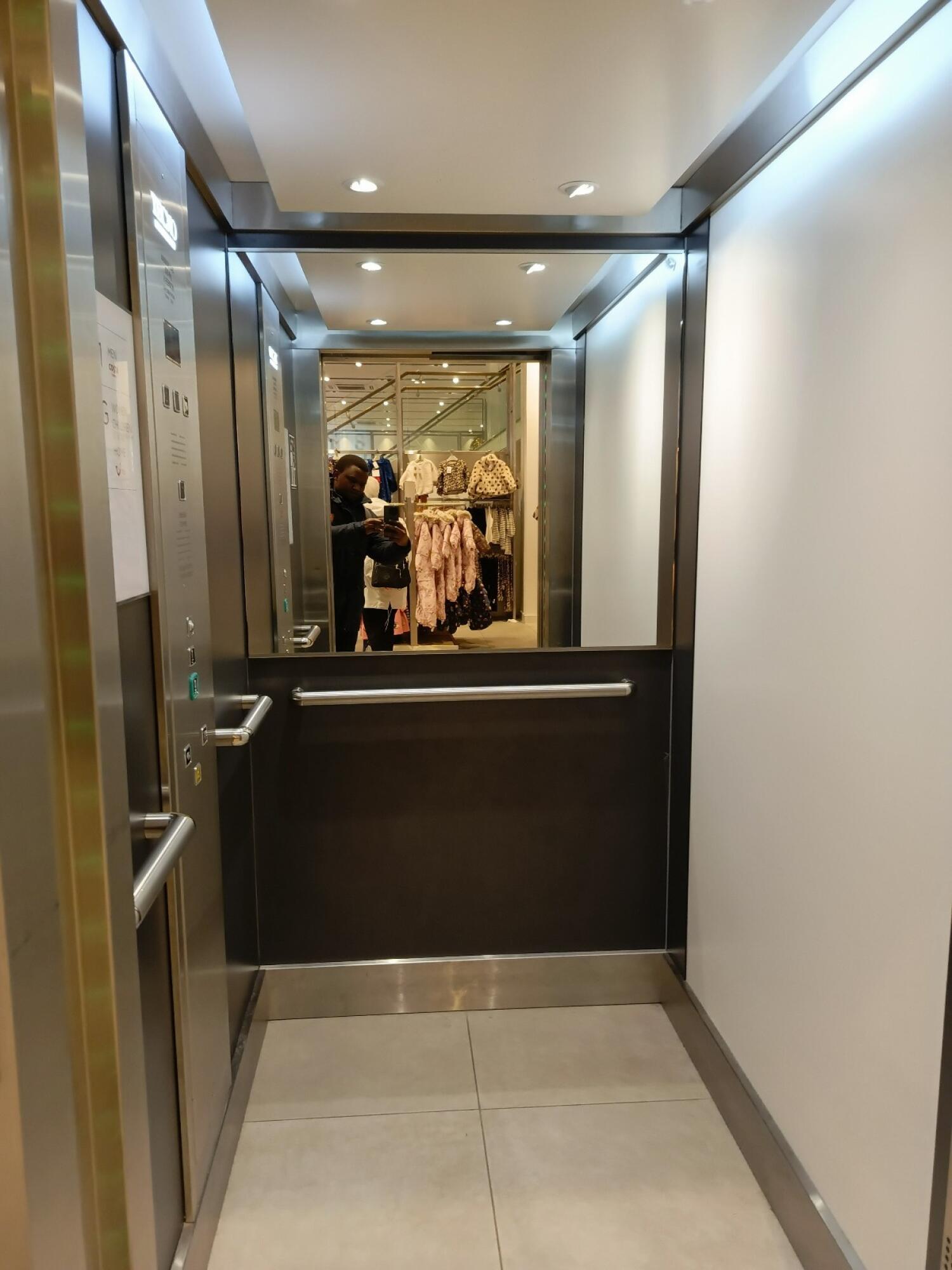 From door facing straight. Grab rails on Left and center.
