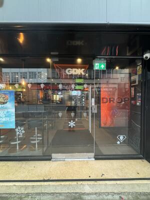 Glass door ahead. Push handle in right to open.