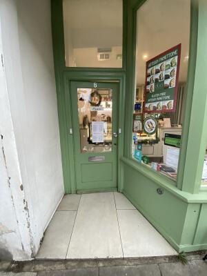 Opening to entrance door. Entrance door at back.