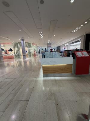From entrance facing straight. Counter at back.