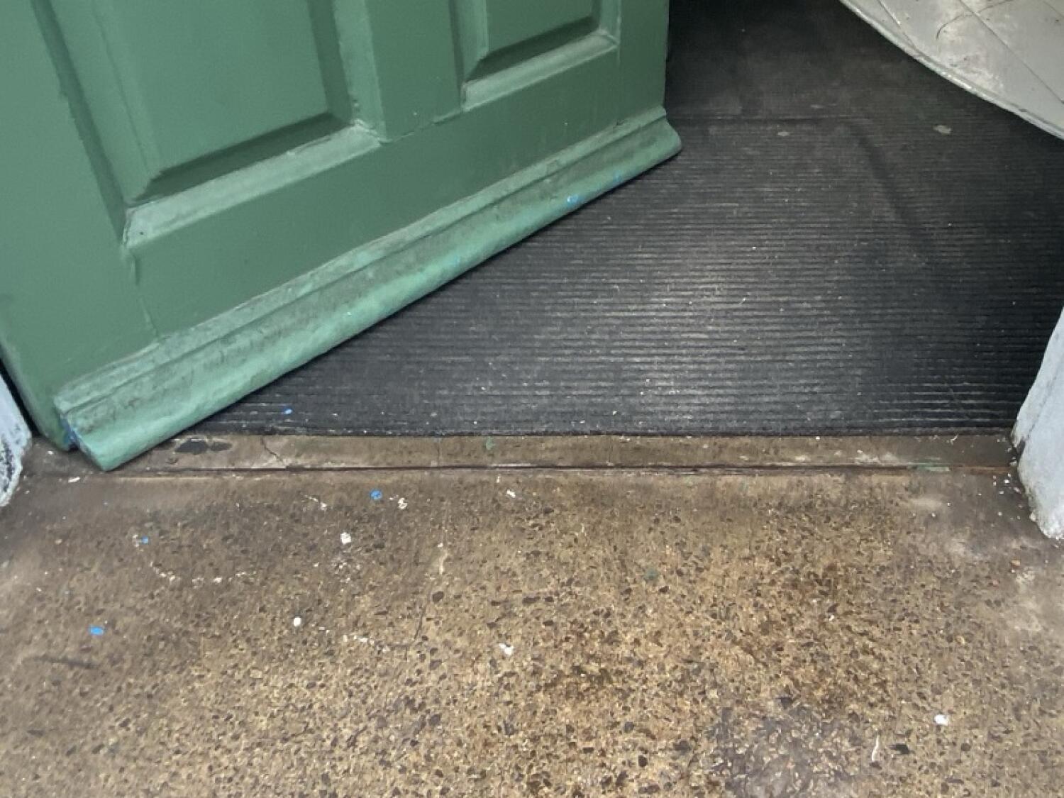 Small bump at door foot. Doormat following.