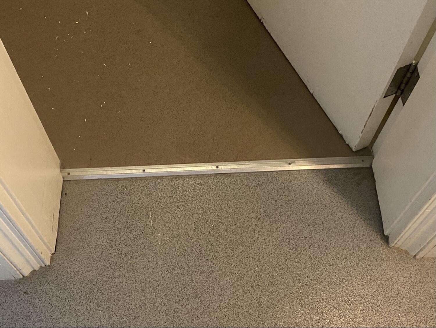 Small metal bump at door foot.