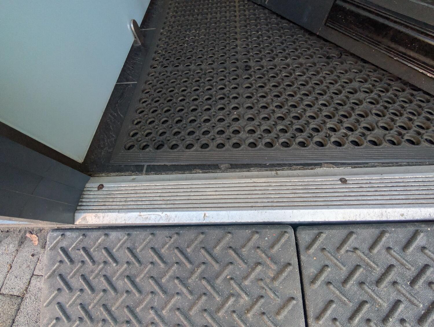 Small bump at doorway. Doormat after.