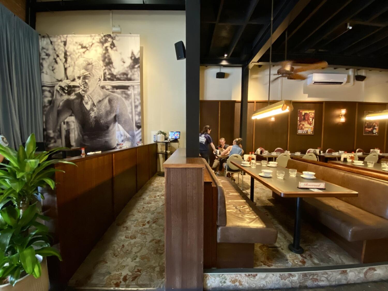 From after welcome desk facing left. Opening on left to seating space.