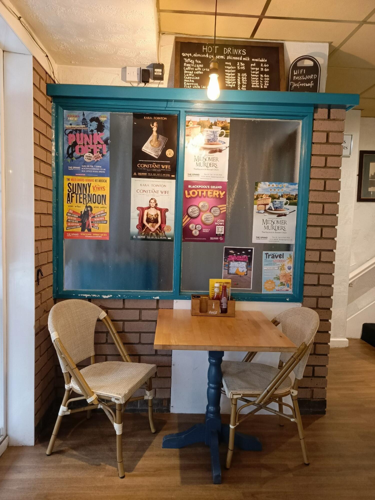From entrance facing right. Table and chairs ahead.