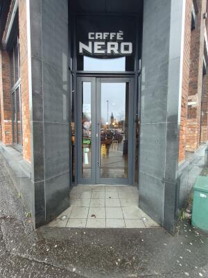 Opening to entrance door at back.