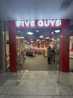 Glass doors ahead. Pull from metal handles at centre to open.