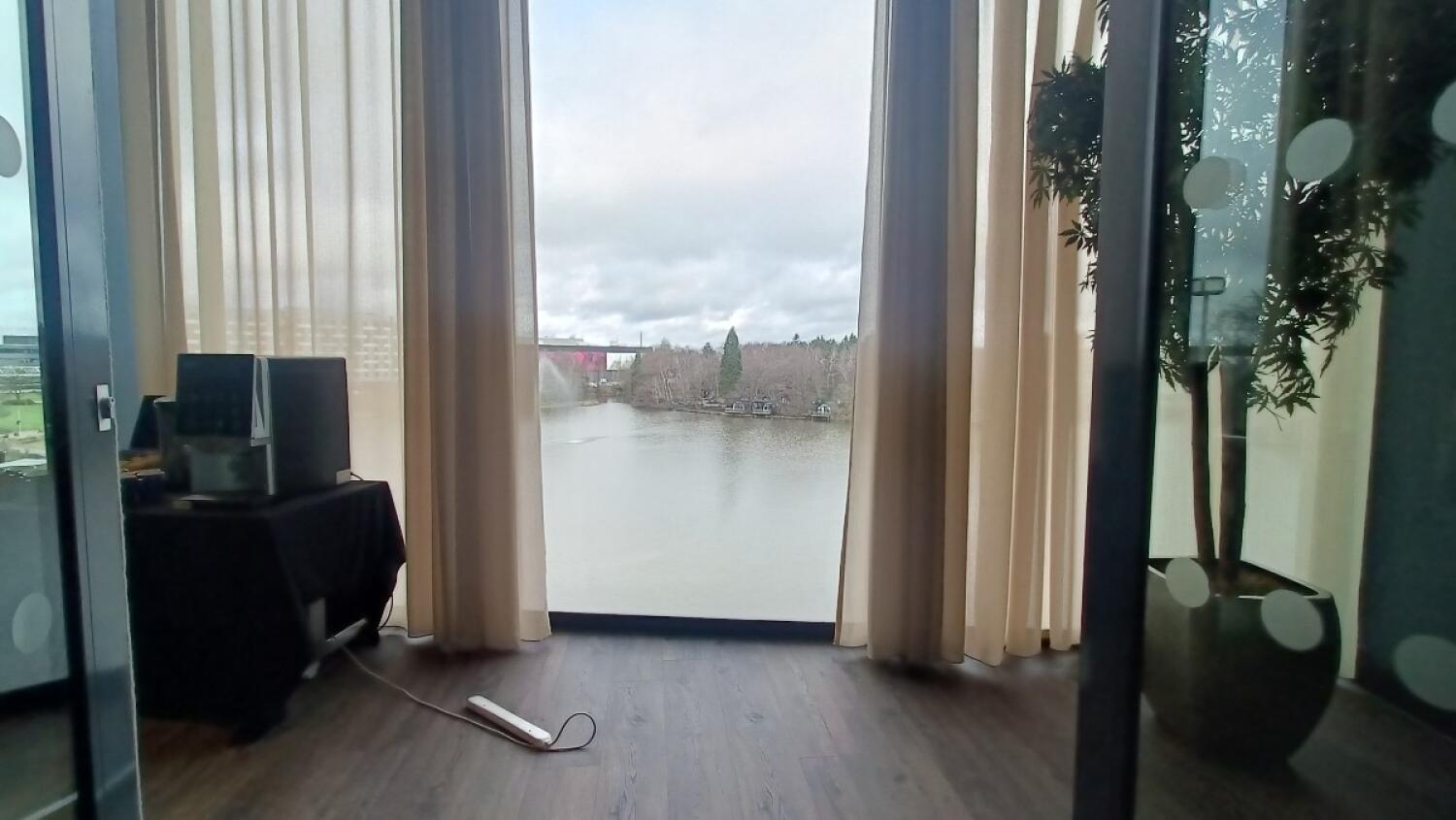 From door facing straight. Table on back right.