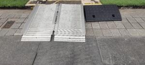 Ramp leading up to the foot of the door.