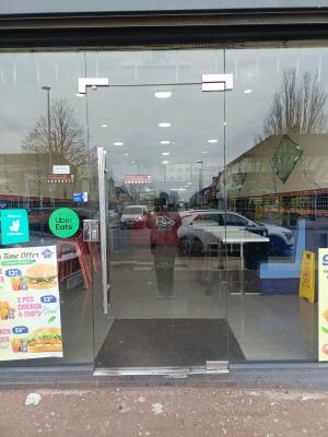 Glass door ahead. Push from handle to open.