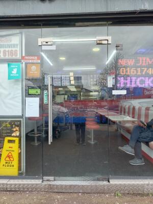 Glass door ahead. Push from handle on left to open.