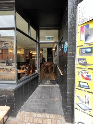 Archway ahead with inbuilt ramp up.