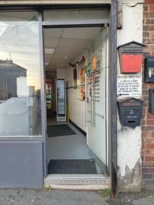Glass door ahead. Push from handle on left to open.