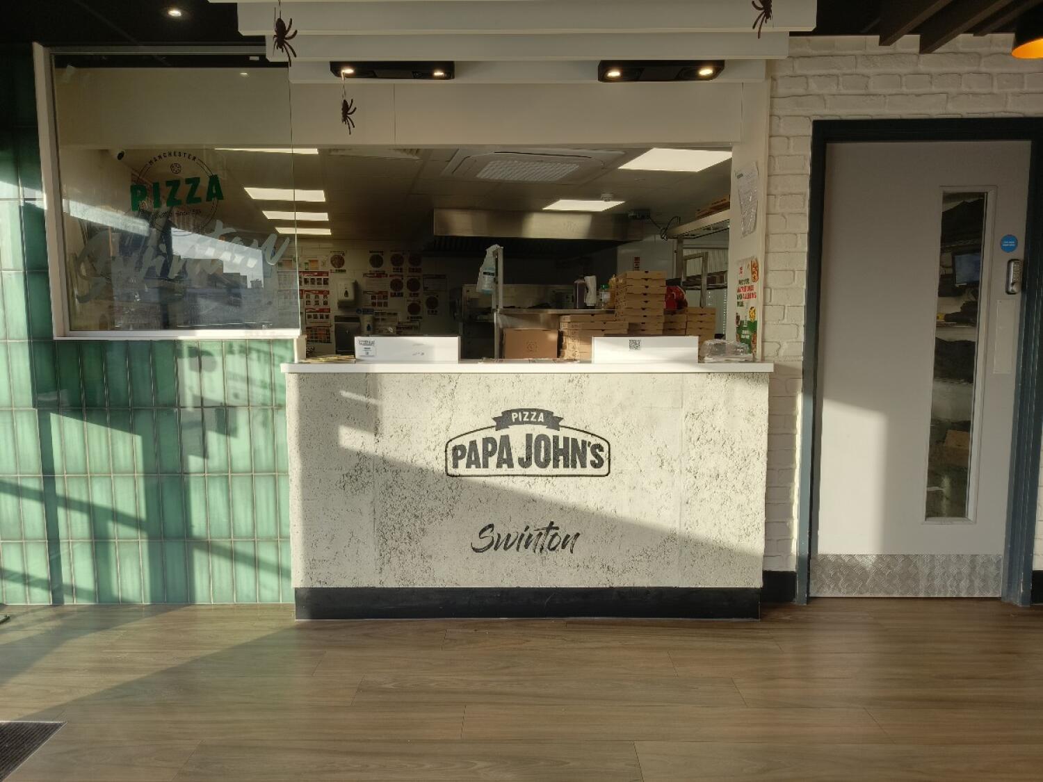 From entrance facing left. Counter ahead.