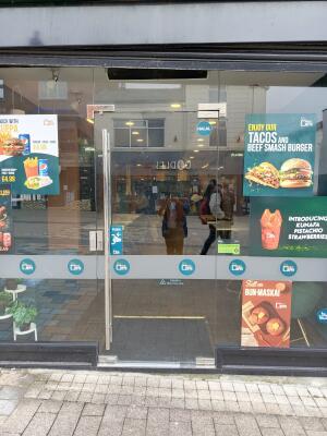 Glass door ahead. Push from handle on left to open.