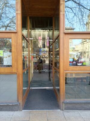 From street facing venue. Open archway ahead.