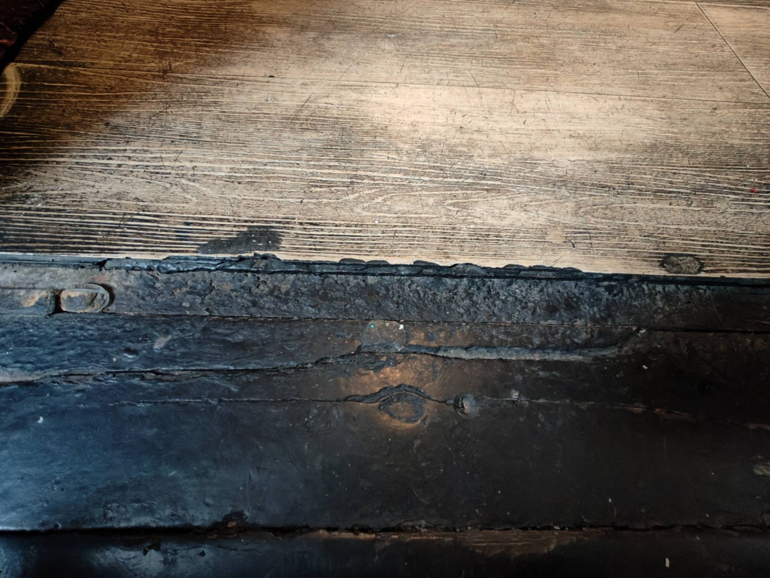 Small bump on threshold of door.