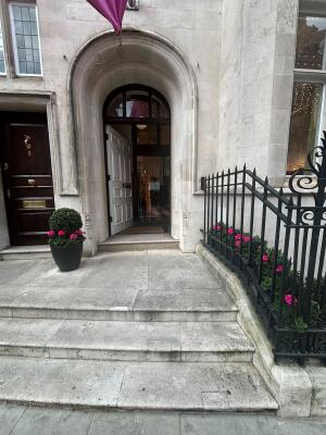 Three steps up to entrance.