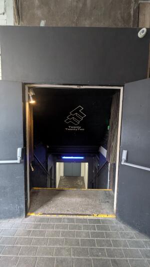 Black doors. Pull in centre to open.