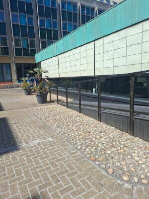Path continues ahead, with railing along right.