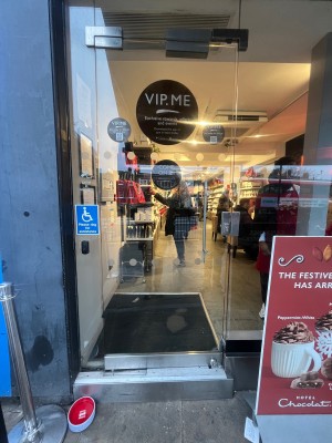 Glass door ahead. Push from right to open.