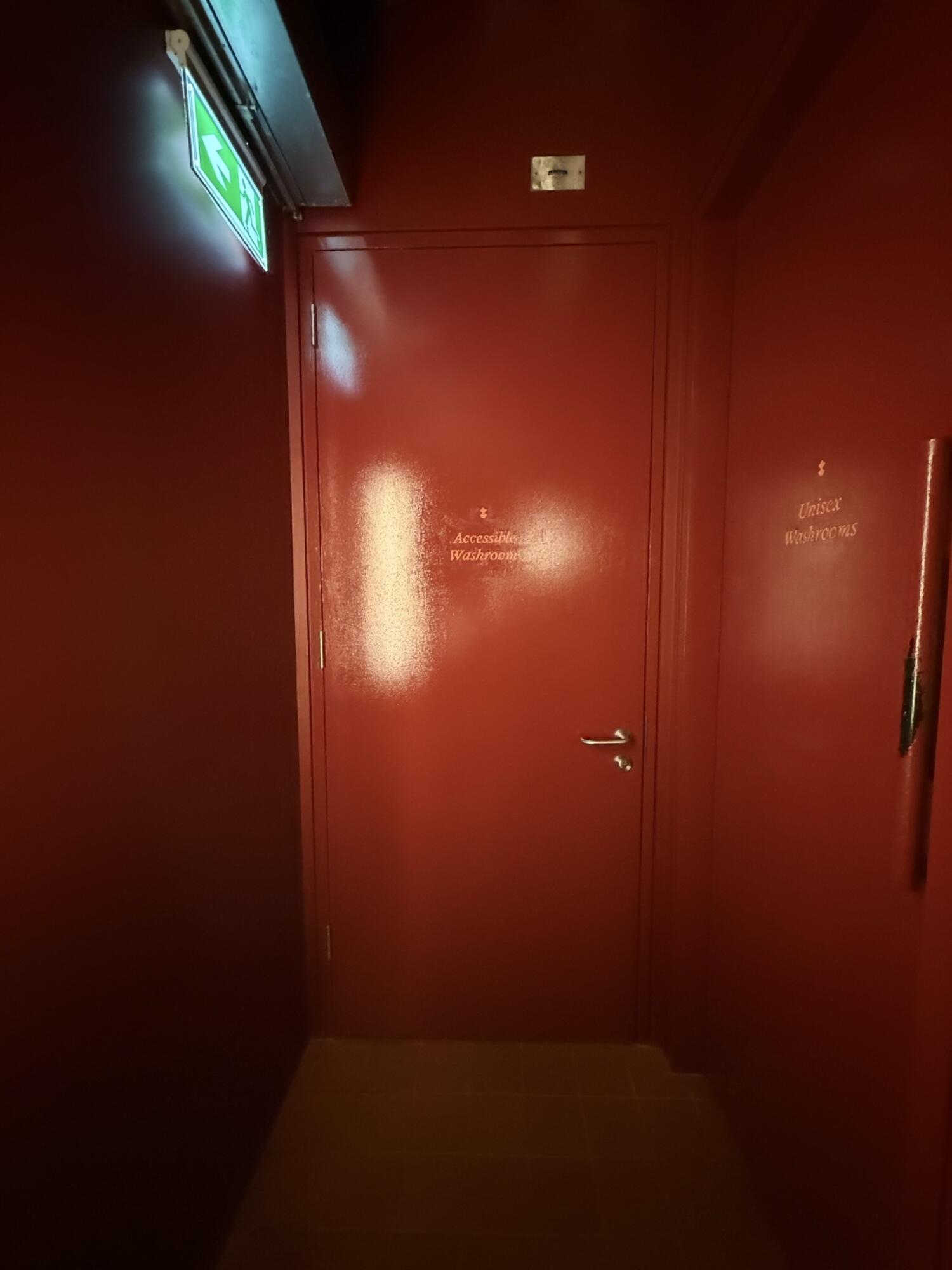 Red door. Use handle to open.