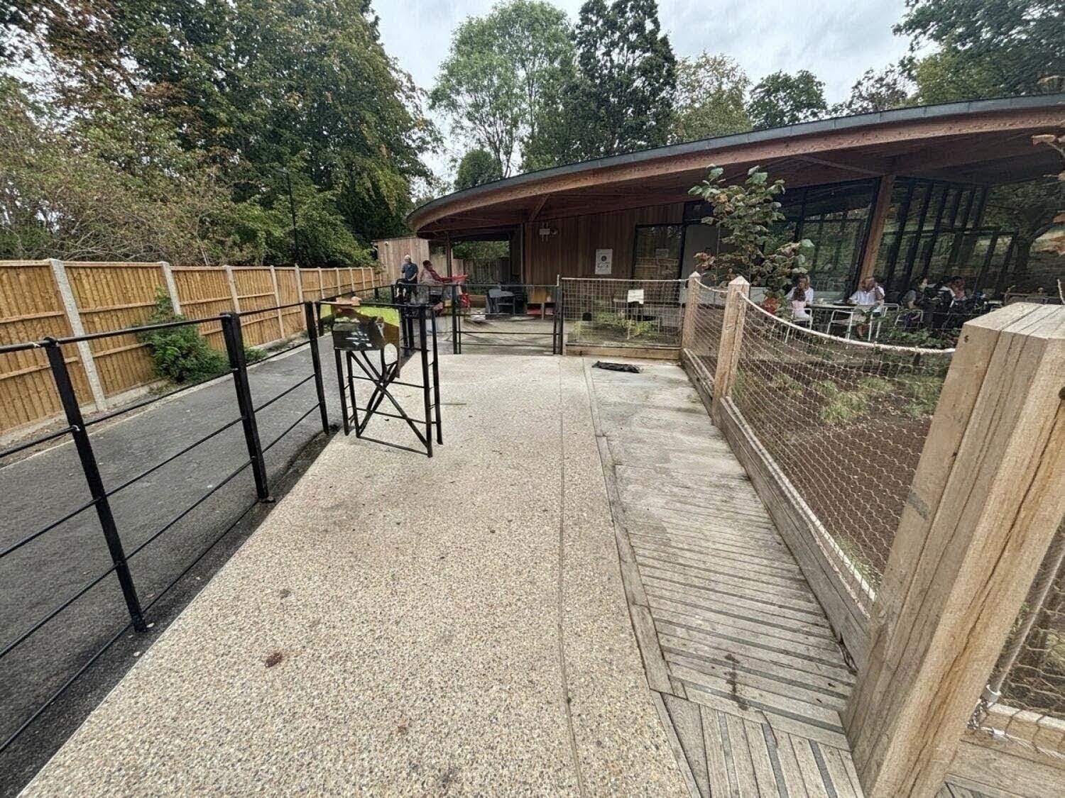 From end of path facing straight.  Buggy parking space along right.