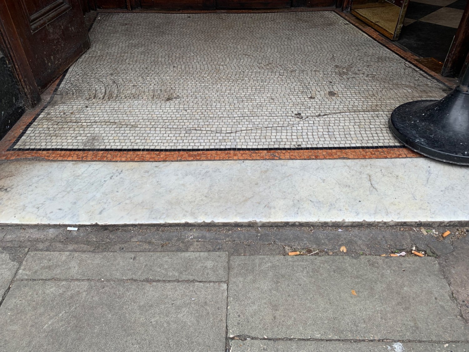 Small raised edge across threshold of doorway.