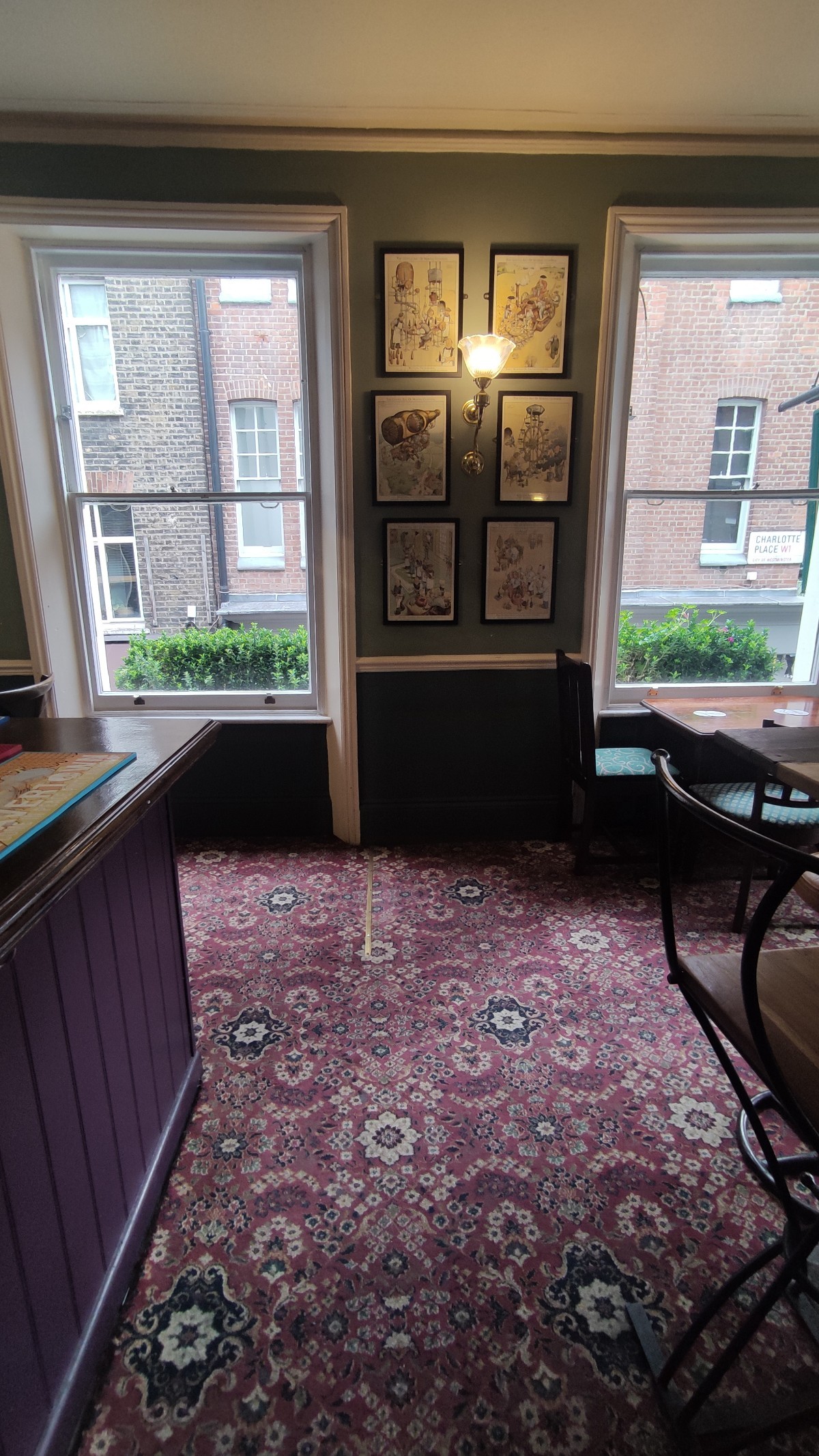 From table facing right. Path ahead. Bar along left.
