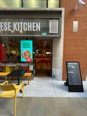 Glass door ahead. Push from silver handle on left to open.