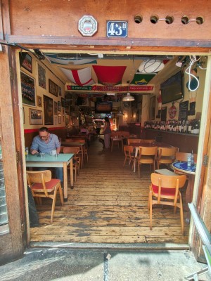 Facing entrance. Pull doors from centre to open.
